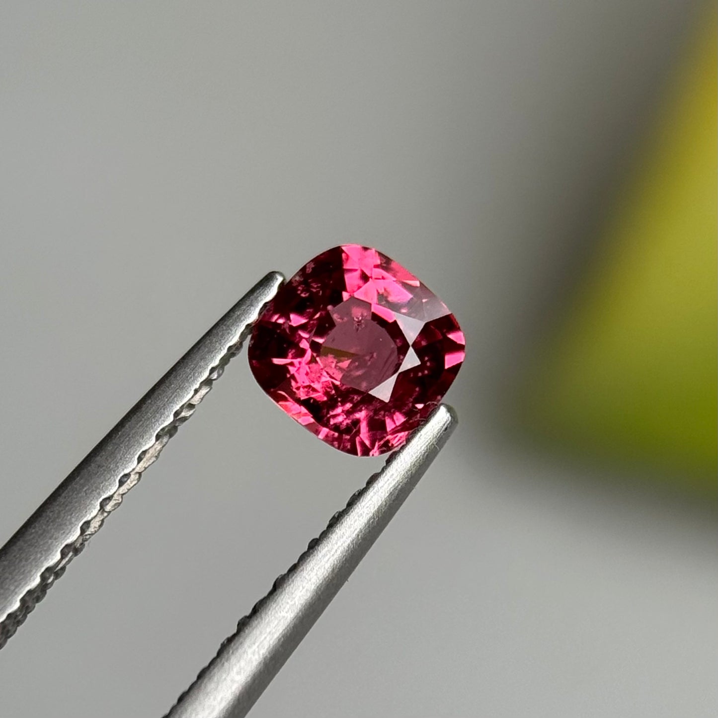 0.79 ct Natural Orangish Pink Spinel Vietnam. Cushion Shape.