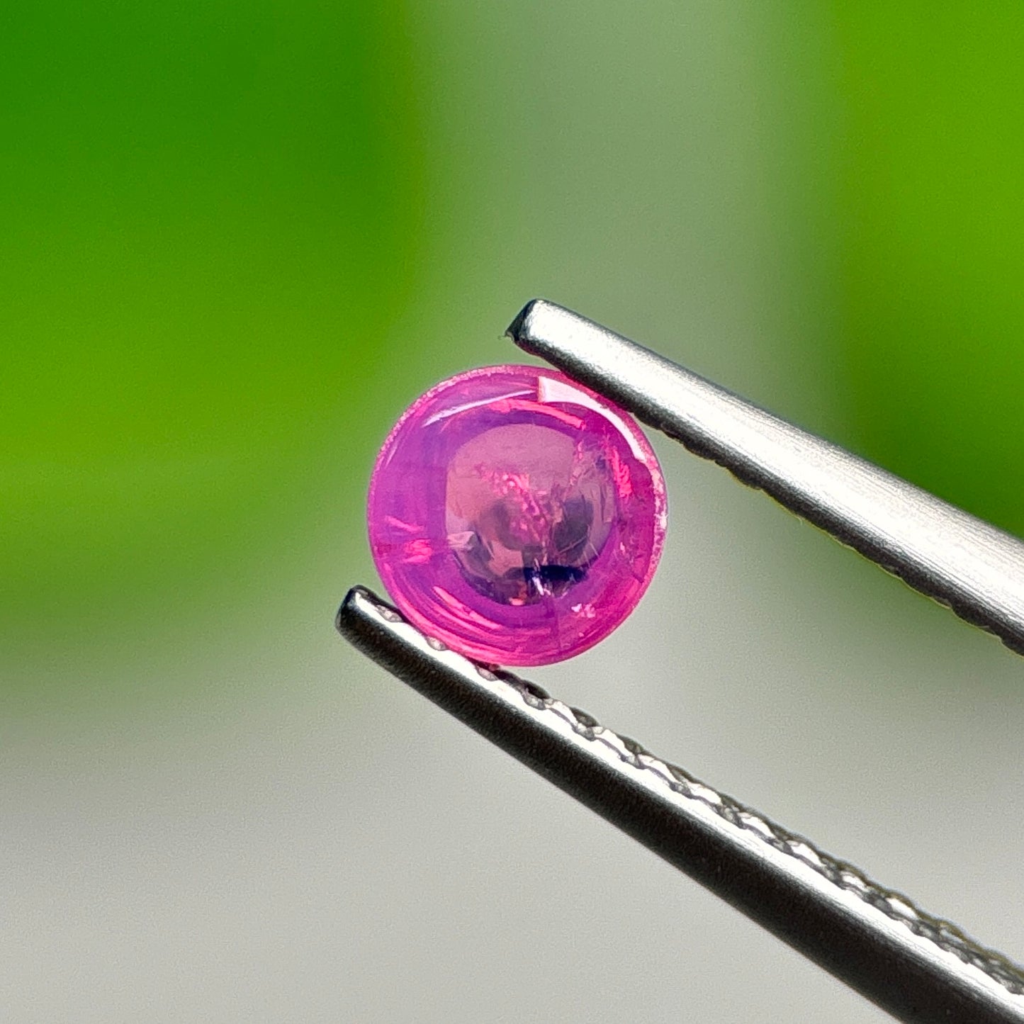 0.57ct Natural Purplish Pink Cacbochon Sapphire Viet Nam. No treatment.