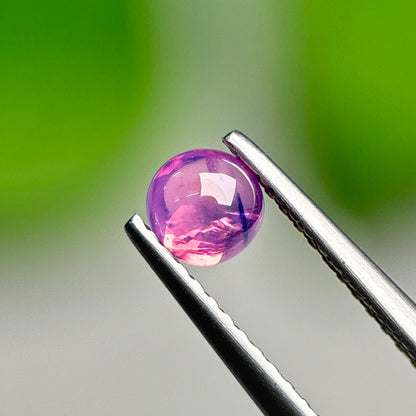 0.57ct Natural Purplish Pink Cacbochon Sapphire Viet Nam. No treatment.