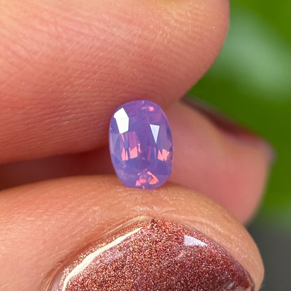 0.50 ct Natural Pinkish Purple Milky Sapphire Vietnam. Oval Shape. No Treatment.