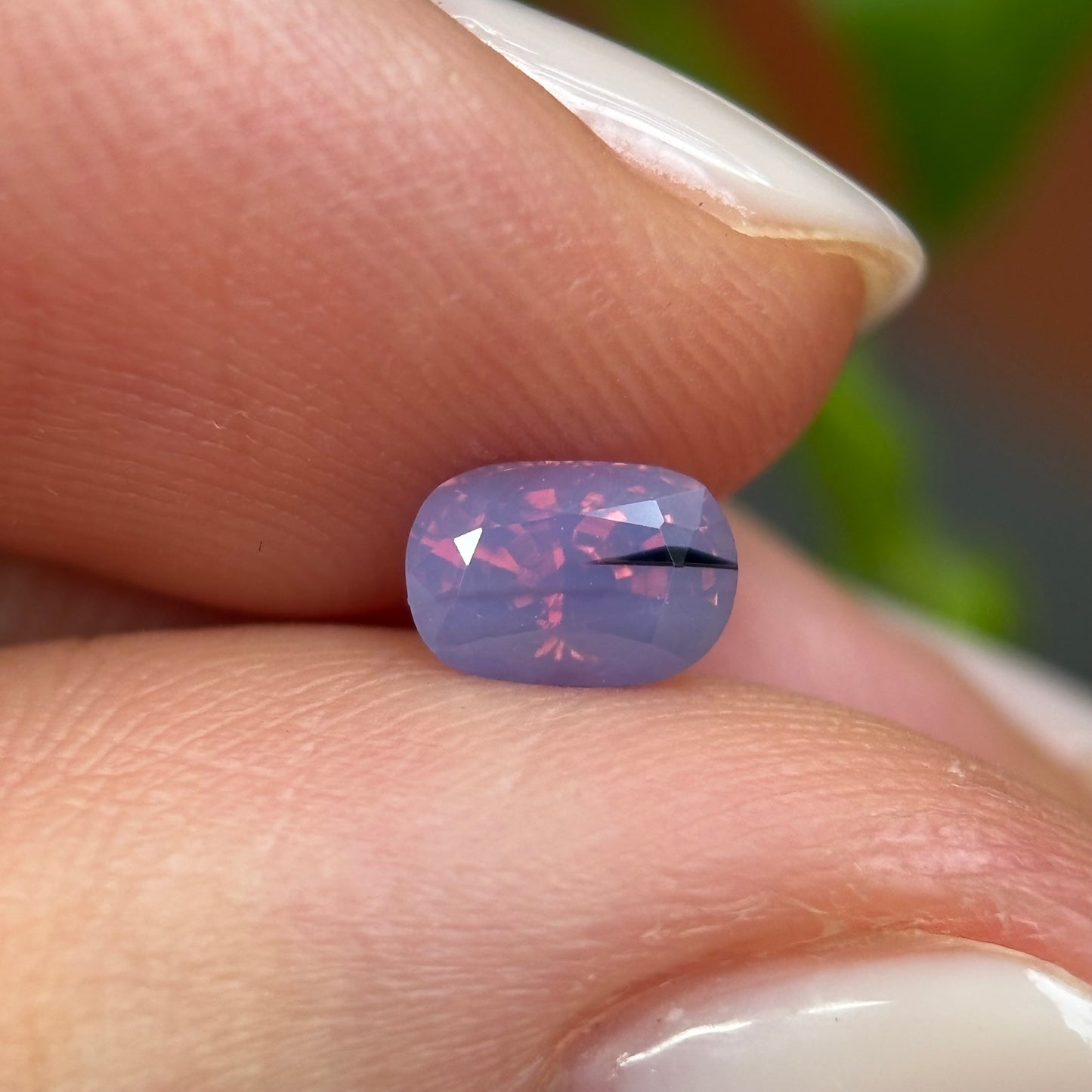 0.66 ct Natural Pinkish Purple Milky Sapphire Vietnam. Cushion Shape. No Treatment.